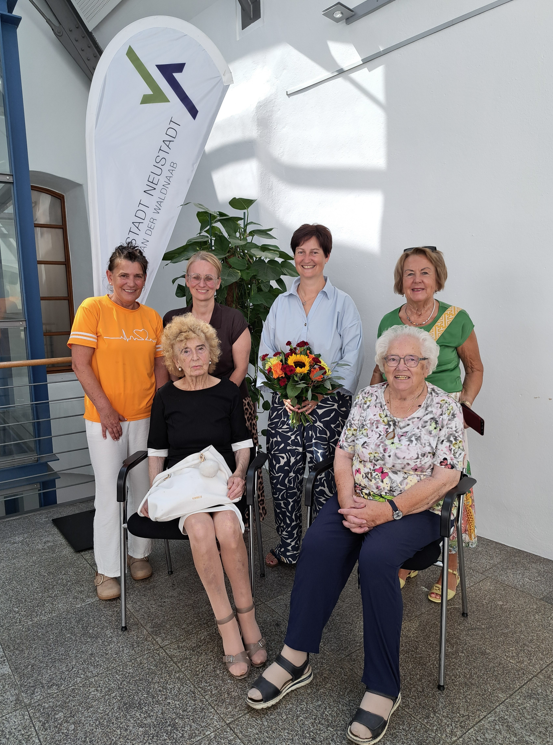 Gruppenfoto vor Beachflag